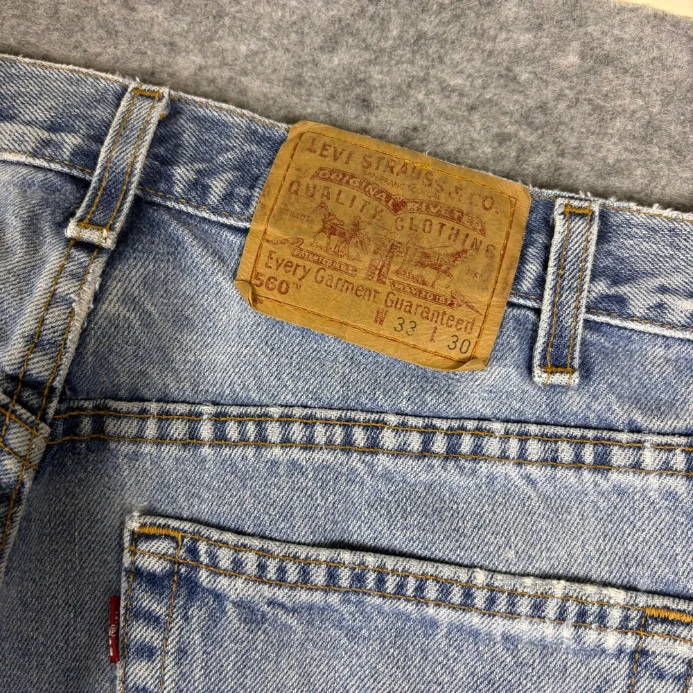 Vintage 90s Levis 560 Loose Fit Tapered Leg Light Wash Denim Jeans 33x30 USA
